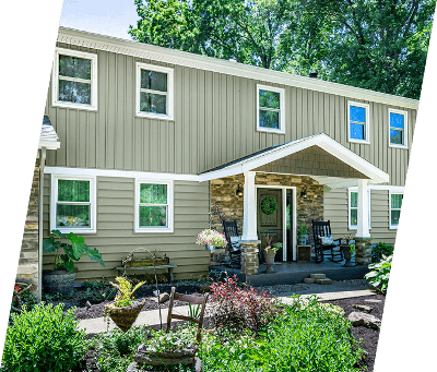 Greenhouse Exterior with Porch by Janes Exteriors in Delaware